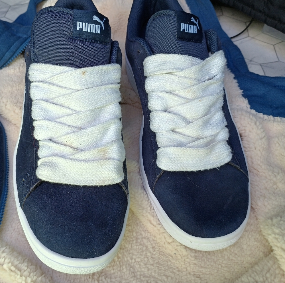 classic navy Puma sneakers with fat laces